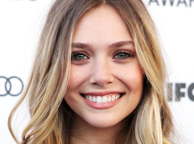 A person in a coat

AI-generated content may be incorrect.